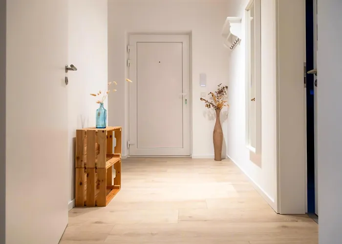 Zentrale Neubauwohnung In *